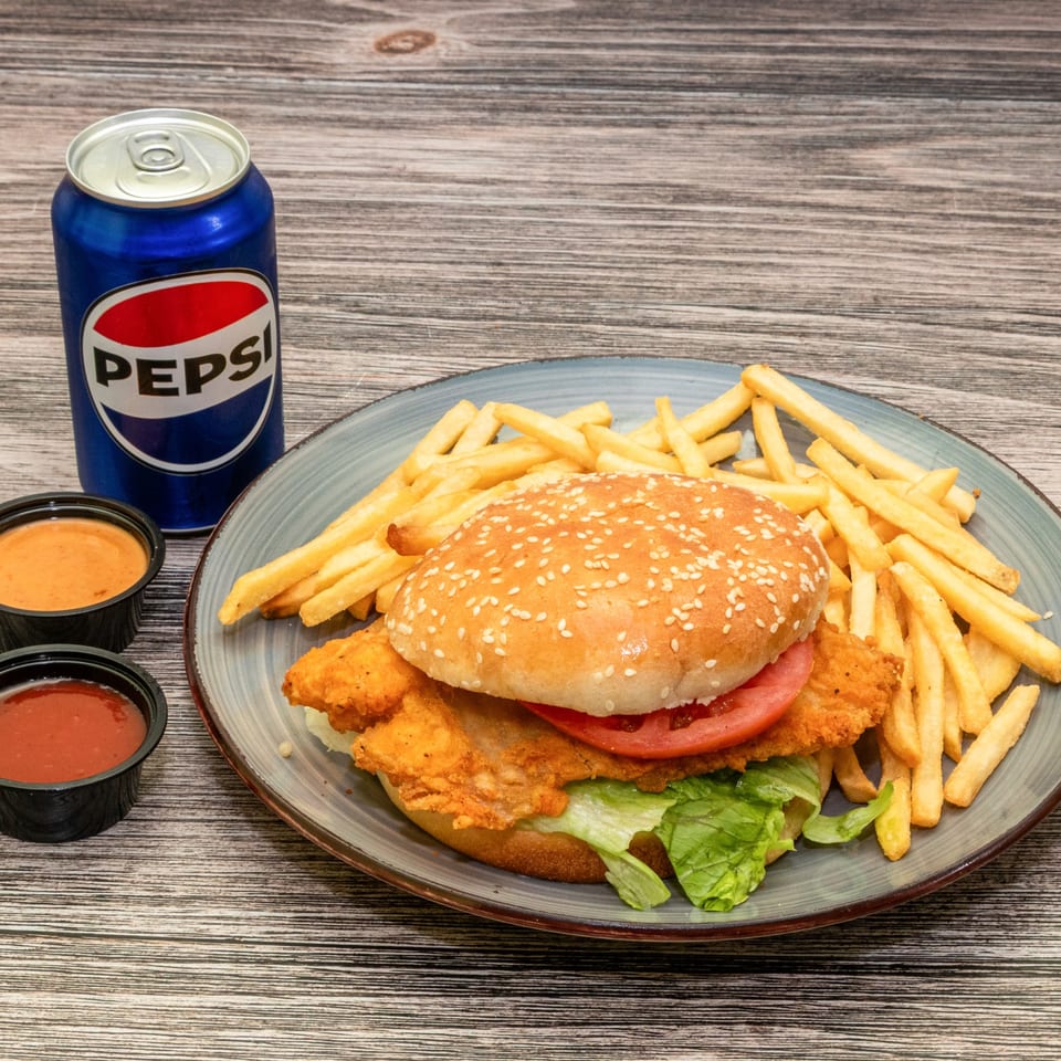 Fish sandwich combo with fries and a drink.