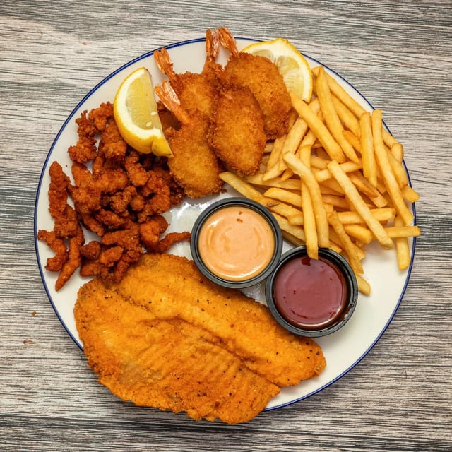 28. Combo Sea Food- 1 Pc Fish, 6 Pcs  Jumbo Shrimp, 6 Pcs of Clam Strips with Fries.